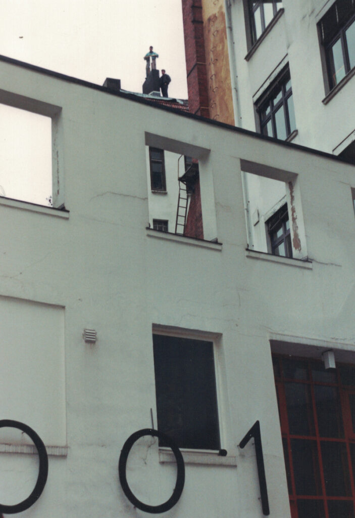 Schornsteinfeger auf dem Dach